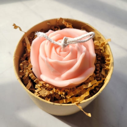 large peach rose candle made of soy wax and beeswax in a gift box