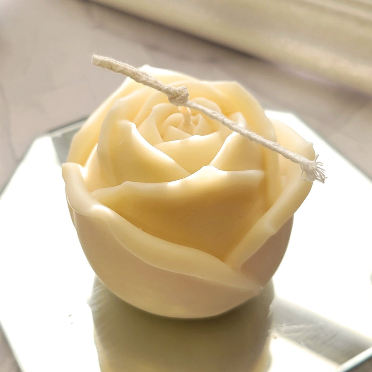 large ivory rose candle made of soy wax and beeswax